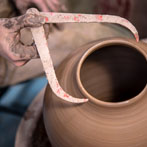 Doug Fitch and Hannah McAndrew making a jug for me